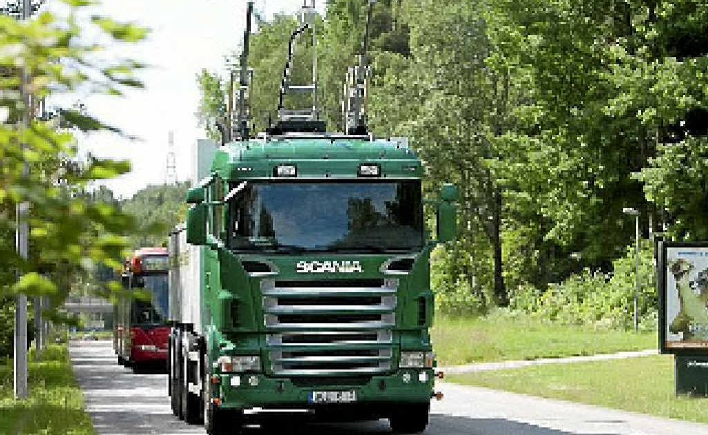 HOOKED UP: Scania and Siemens’ electrically powered experiment hybrid truck with current collectors. HOOKED UP: Scania and Siemens’ electrically powered experiment hybrid truck with current collectors.